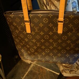 Louis Vuitton Monogram Handbag in Brown and Tan